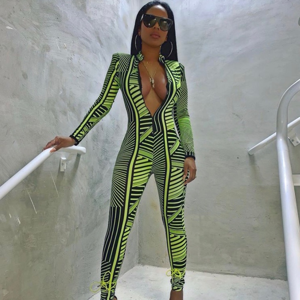 Green & black jumpsuit.